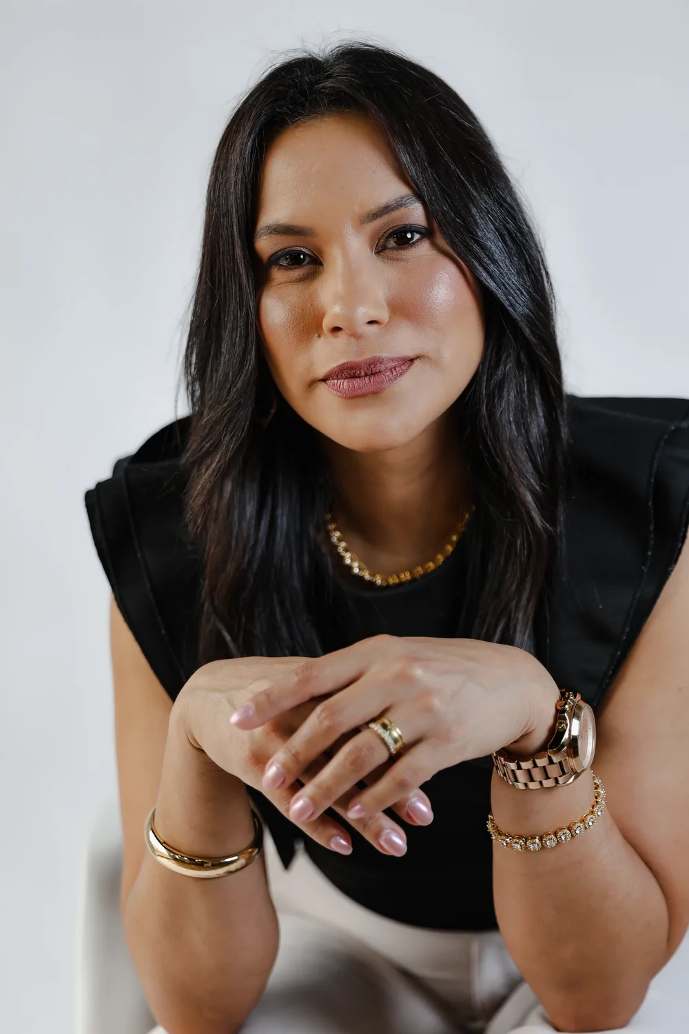 Retrato da Dra. Evelyn Rangel, cirurgiã-dentista especialista em implantodontia